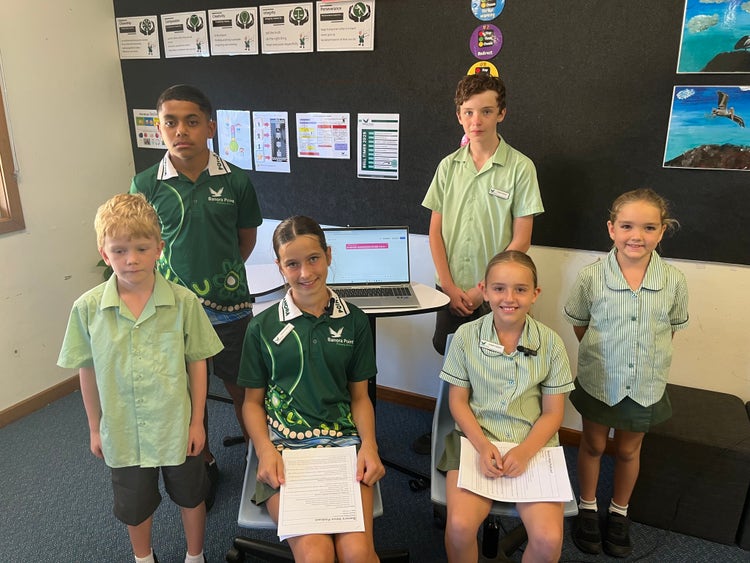 A group of students preparing and recording their episode for our school's podcast.